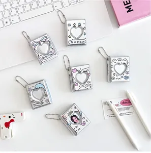 Mini photo album keychain with heart hollow design and various cute cartoon patterns