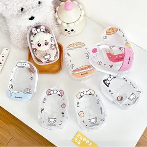 Macro detail of transparent PVC doll bags with colorful cartoon patterns and zipper closures