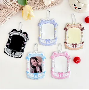 Macro detail of various colors of cute cat ear card sleeves with hanging chains