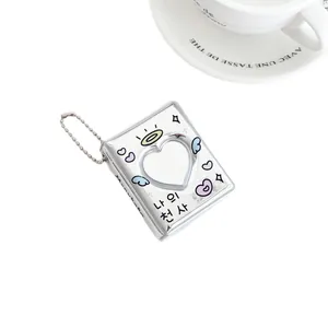 Mini silver heart cutout photo album pendant with Korean angel motif and ball chain