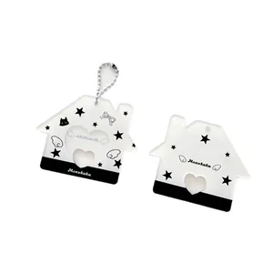 Porte-carte en acrylique en forme de maison avec motif d'étoiles noires et blanches