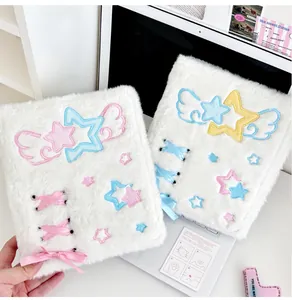 Detail of plush A6 binder cover with star embroidery and cross-ribbon lace-up design
