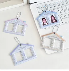 Detail of house-shaped photocard holder with double slots and metal beaded chains