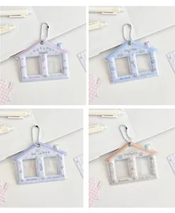 House-shaped double photo card holder keychains in pastel PVC with two windows
