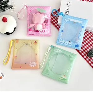 Close-up of four colorful transparent PVC doll carrier bags with cute illustrations