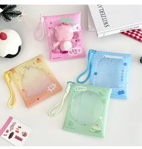 Detail of four colorful PVC display bags with wrist straps and metal snap fasteners