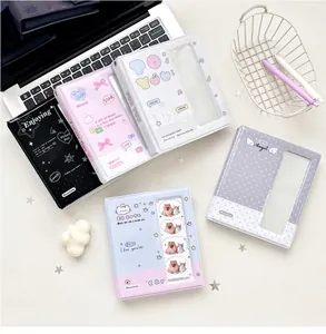 Macro shot of 3-inch mini photo albums in five colors with cute patterns and clear pockets