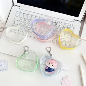 Mini bolsas de PVC transparente en forma de corazón en seis colores con llaveros de metal