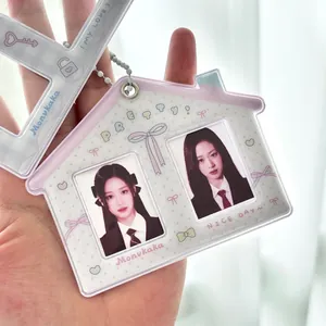 Pink house-shaped photocard holder keychain with double slots and sweet decorative prints