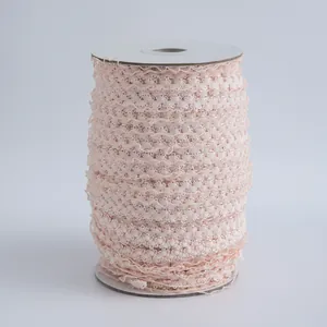 Dettaglio di nastro in pizzo elastico a corona rosa chiaro 1,5 cm per bambole DIY