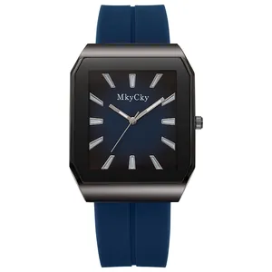 Detail of grey brushed metal octagonal case and gradient blue dial of men's quartz watch