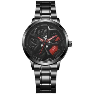 Detail of creative rotating wheel car rim dial with red brake caliper and steel band