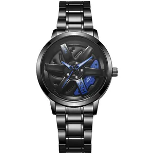 Macro view of black steel watch featuring a rotatable five-spoke wheel hub and blue calipers