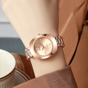 Elegant rose gold women's quartz watch with crystal indices on a rectangular dial