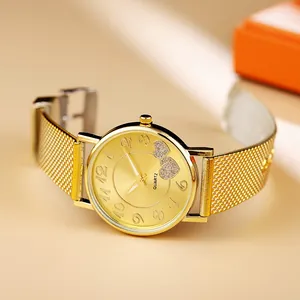 Women's gold quartz watch with Milanese mesh band and heart-patterned dial display