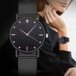 Elegante reloj de cuarzo para mujer con esfera de cielo estrellado y malla negra