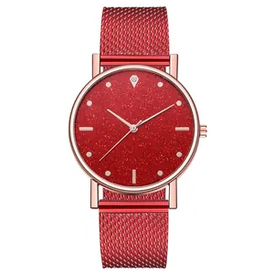 Reloj de mujer de cuarzo en oro rosa con esfera de cielo estrellado y correa de malla roja