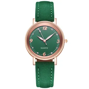 Detail of emerald green sunray dial with rose gold case and luminous quartz markers