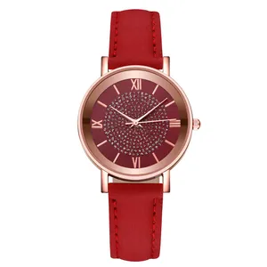Women's quartz watch with red leather strap and sparkling rhinestone starburst dial