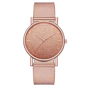 Elegante reloj de cuarzo rosa para mujer con esfera brillante y correa de malla milanesa