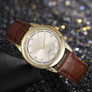 Orologio al quarzo da uomo con cassa dorata, quadrante champagne e cinturino in pelle
