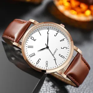 Montre quartz homme avec boîtier or rose, cadran blanc et bracelet en cuir marron