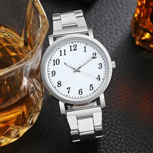 Silver quartz watch with white dial and steel band next to a whiskey glass for men