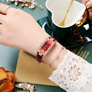 Elegant ladies rectangular quartz watch with red leather strap and crystal accents