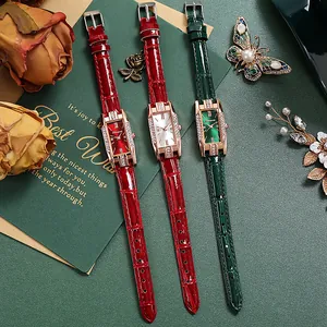 Detailed flat lay of three vintage rectangle quartz watches with rhinestone bezels