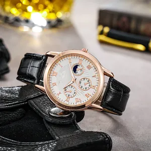 Classic men's business watch with rose gold case and black leather strap on gloves