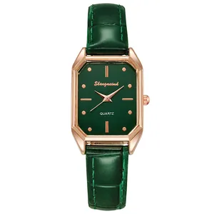 Montre à quartz élégante pour femme avec boîtier rose doré et bracelet en cuir vert