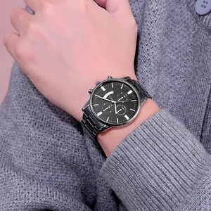Classic all-black men's business quartz watch with steel strap worn on a wrist