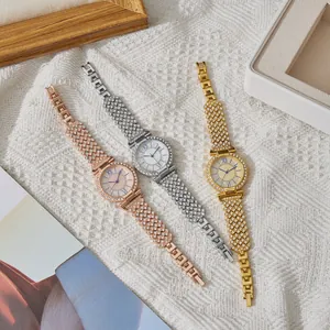 Elegant women's quartz watches in gold, silver, and rose gold with full diamond crystal accents
