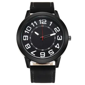 Detail shot of black quartz watch face with large white numerals and leather strap