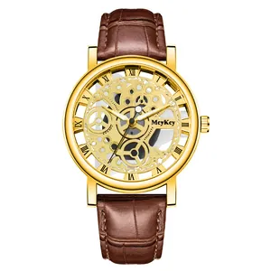 Detail of gold skeleton watch dial with Roman numerals and brown leather strap