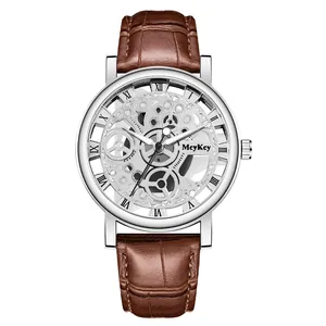 Detail of skeleton dial with silver mechanical gears and brown crocodile leather strap