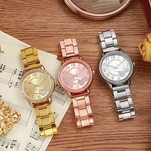 Elegant ladies quartz watch set with diamond-encrusted bezel and heart dial motifs