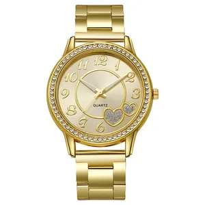 Women's gold quartz watch with rhinestone bezel and heart pattern champagne dial
