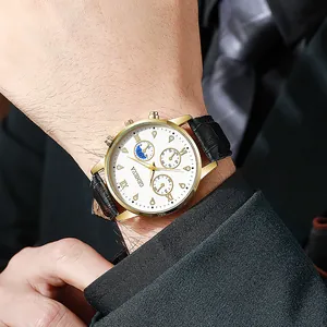 Classic Geneva business watch with gold case, white dial, and black crocodile leather strap