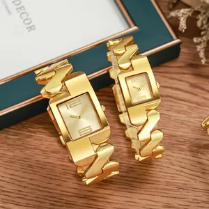 Elegante vintage gouden kwartshorloges voor koppels met decoratieve metalen schakelbanden