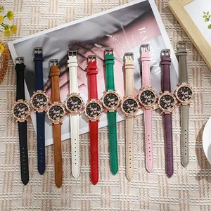 Flat lay of women's butterfly pattern quartz watches in ten colorful leather strap options