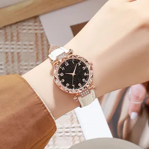 Orologio da donna in oro rosa con lunetta in strass, quadrante cielo stellato e cinturino bianco