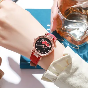 Montre quartz pour femme avec bracelet en cuir rouge et cadran étoilé cœur en or rose