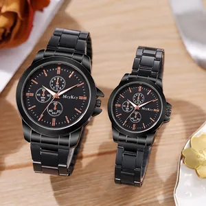 Coffret montres à quartz pour couple avec bracelets en acier noir et détails rose doré