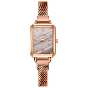 Detail of OUKI women's quartz watch featuring marble texture dial and rose gold mesh band