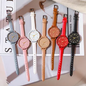Set of seven vintage thin leather strap quartz watches for women in assorted colors