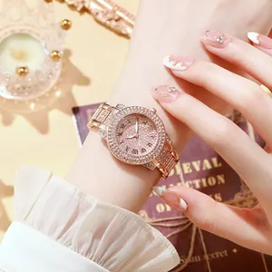 Detailed view of rose gold women's watch with full crystal pavé and Roman numerals
