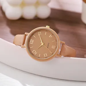 Classic minimalist quartz watch with milk tea color strap and gold Arabic numerals
