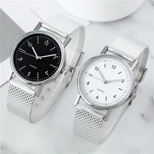 Minimalistische Quarz-Damenuhr mit silbernem Mesh-Armband und Leuchtzifferblatt