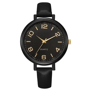 Classic vintage quartz watch with black leather strap and gold numerical indices